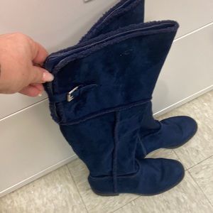 Over the knee flat boots